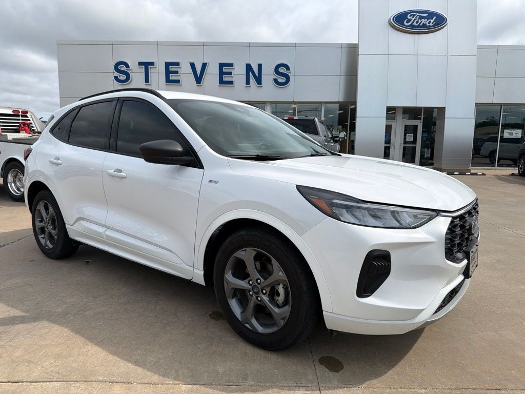 2023 Ford Escape ST-Line in Oxford White — front three-quarter view