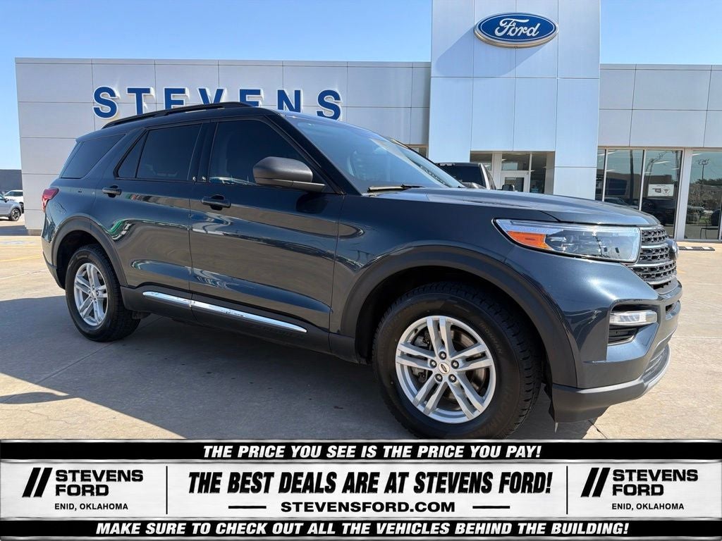 2024 Ford Explorer XLT in Stone Blue Metallic — front three-quarter view