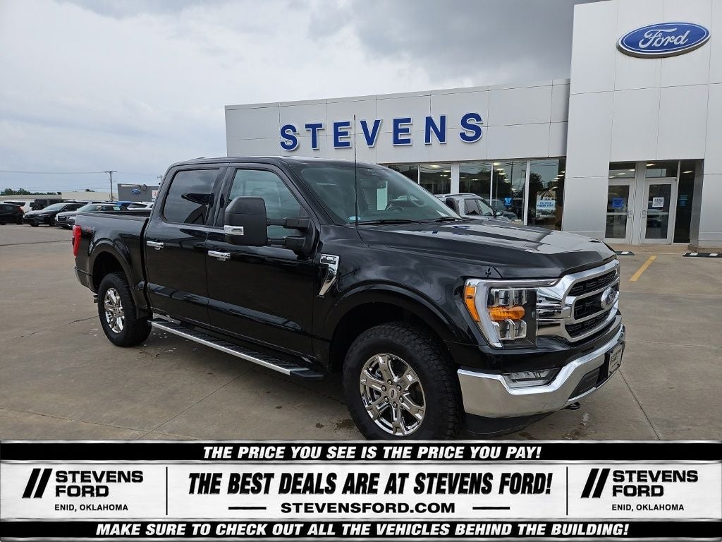 2022 Ford F-150 XLT in Black Metallic — front three-quarter view