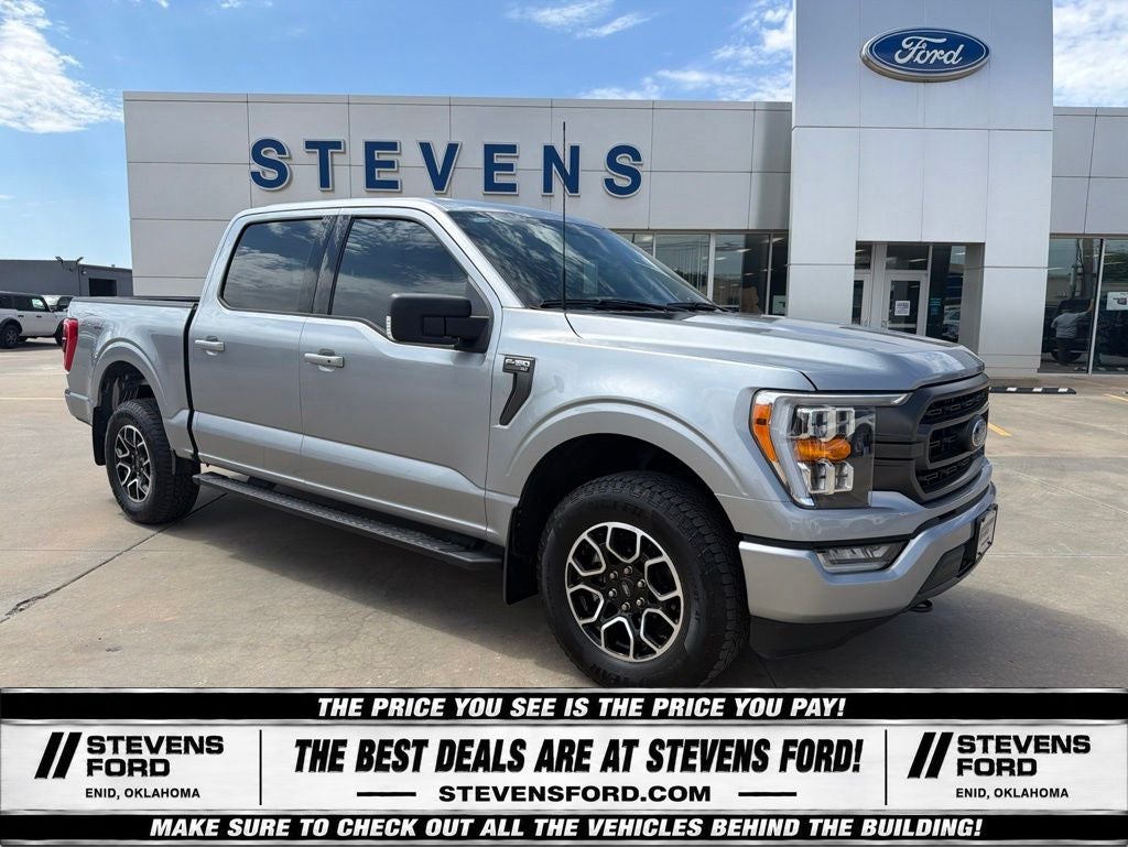 2023 Ford F-150 XLT in Iconic Silver Metallic — front three-quarter view